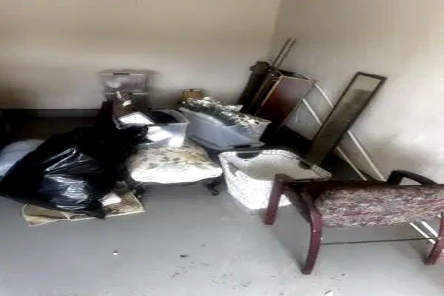 Garage and household items staged before junk removal service